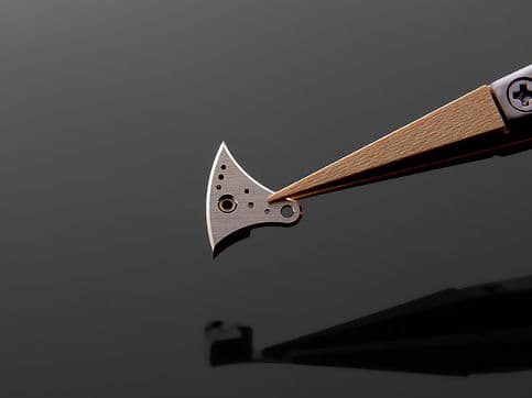 Fleury Manufacture component held with tweezers